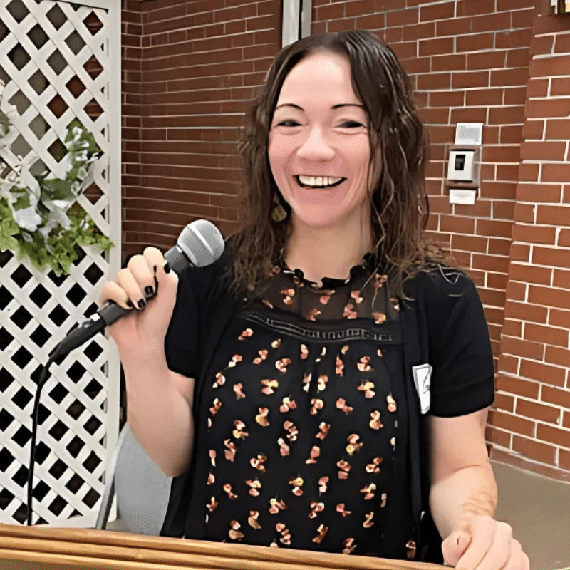 a very happy winner of the contest reading her story